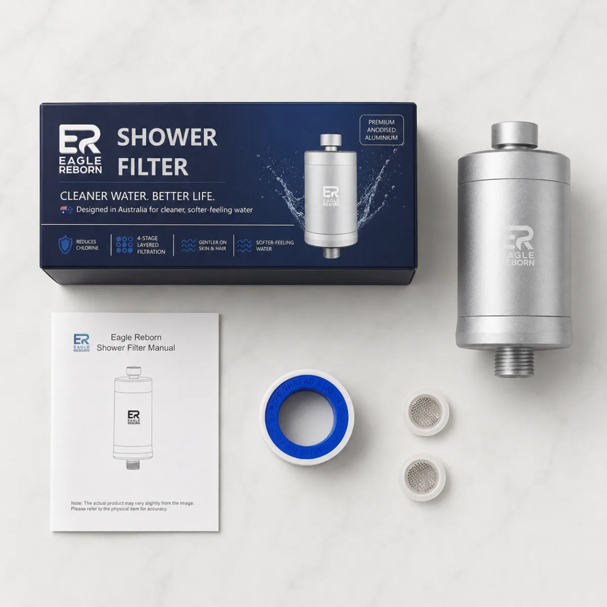 Flat-lay of everything included: retail box, manual, PTFE thread tape, two spare mesh washers and the filter